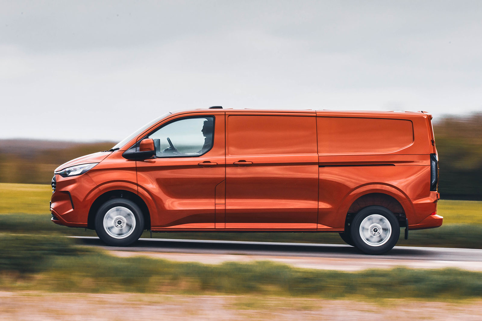 Puma Couriers delivery van on the road