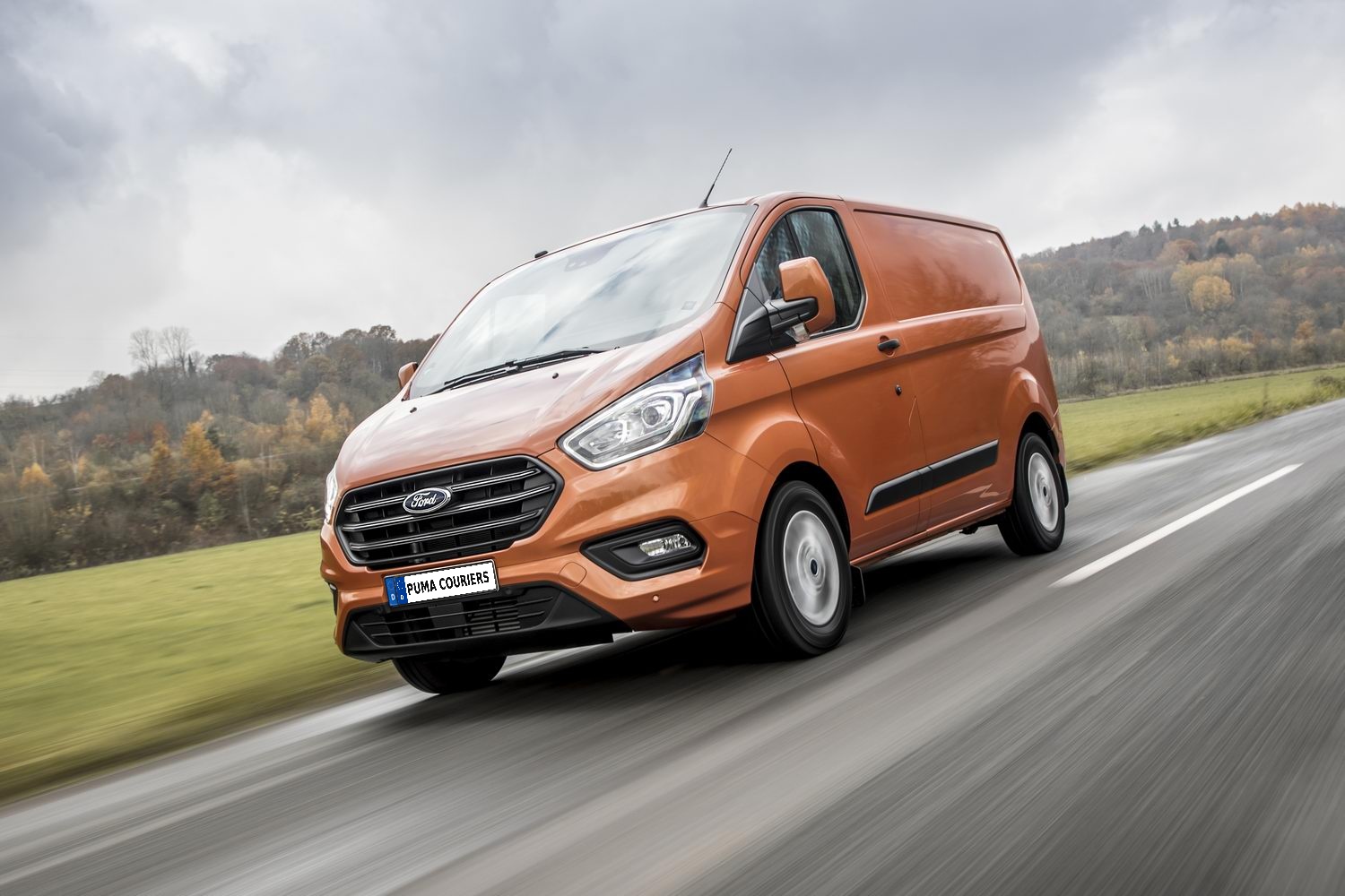Puma Couriers delivery van on the road